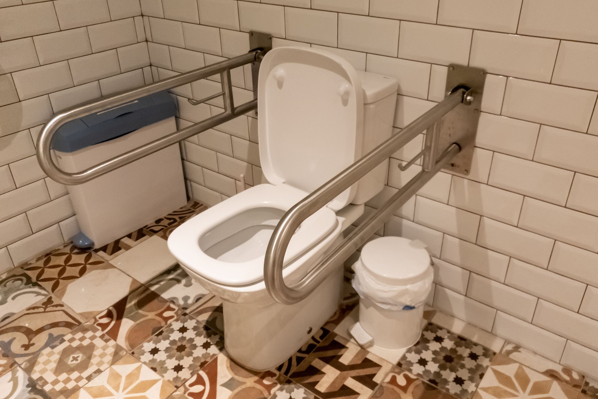 Interior of bathroom for the disabled or elderly people. Handrail for disabled and elderly people in the bathroom